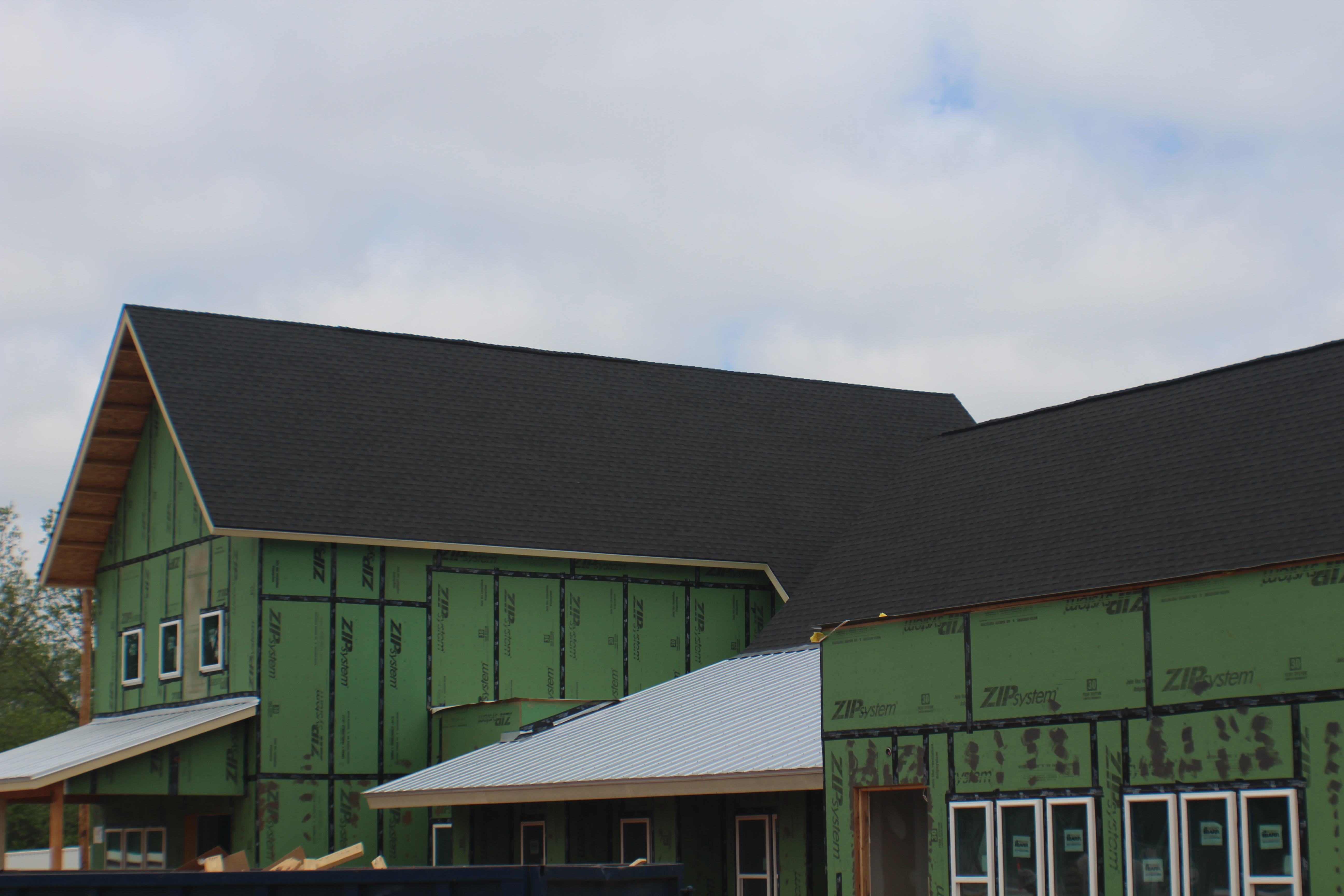 Premier Dwellings roofing — shingle and metal systems