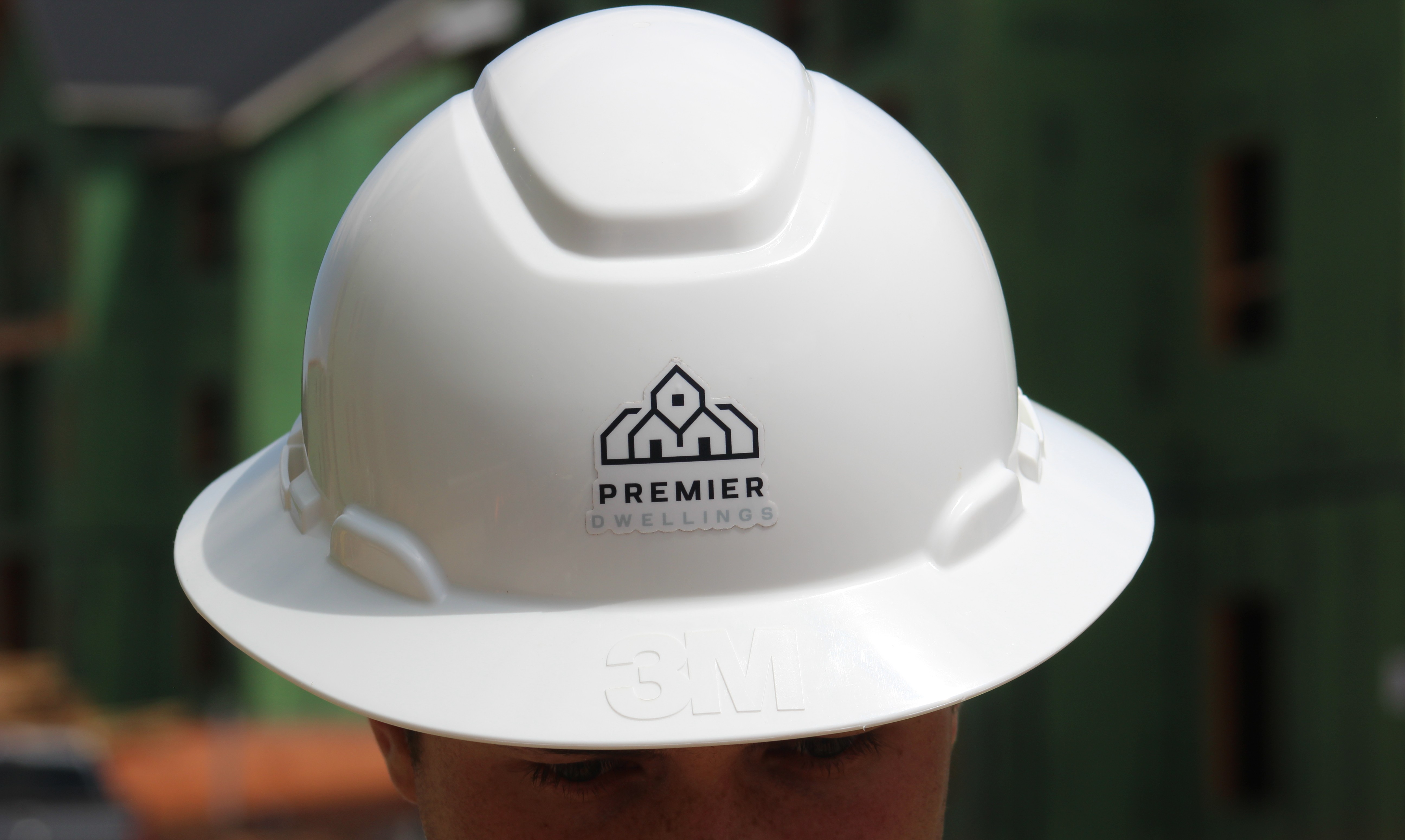 Premier Dwellings hard hat — built with pride